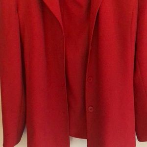 Pretty fully lined coral skirt suit.